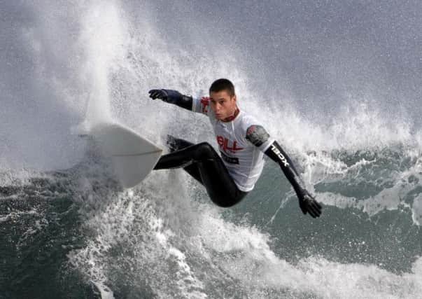 Surfers say colds vanish more quickly when they have been out in salty surf. Picture: Ian Rutherford