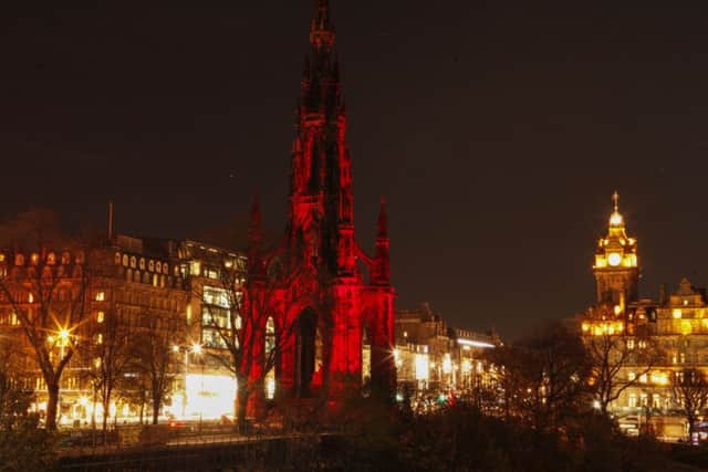 Tthe Scott Monument bathed in red light. Picture: Toby Williams