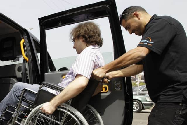 Taxi Cards, will be affected in plans to cut spending next year. Picture: Joseph Eida/AFP/Getty Images