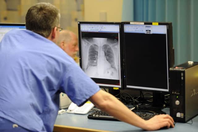 Staff at Edinburgh Royal Infirmary adopt the huddle practice. Picture: Greg Macvean