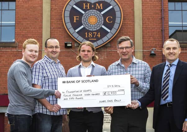 Hearts Fans Rally organisers Craig Wilson and Graeme Kay, Hearts FC Director of Football Craig Levein and Head Coach Robbie Neilson, and Director of Foundation of Hearts, Brian Cormack.  Picture: Malcolm McCurrach