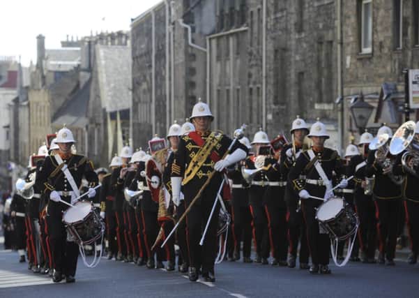 The crew of HMS Edinburgh parade along the Royal Mile, but marches such as these, as well as demonstrations, will be limited. Picture: Esme Allen