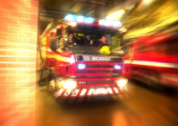 The two-storey building was well-alight. Picture: Tony Marsh