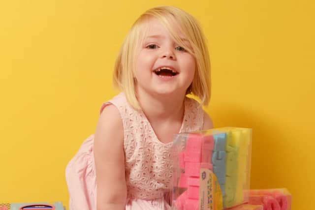 Charlotte Hoehle-Reynolds has raised money for art supplies for children in hospital, as well as donating her hair to the Little Princess Trust for children. Picture: PHIL WILKINSON