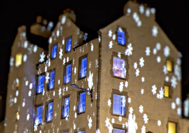 The Grassmarket Hotel is illuminated during a test run for the scheme. Picture: Craig Robertson