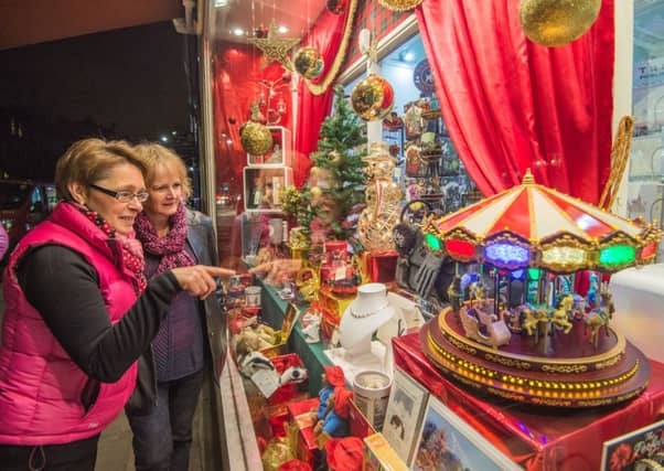 Attractive window displays have a part to play in drawing customers to local shops. Picture: Phil Wilkinson