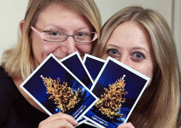 Lesley Ann Stewart and Zoe Robertson launch this year's St Columba's Hospice card. Picture: Gordon Fraser