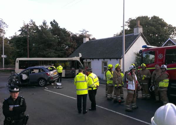 Emergency services at the scene of the crash in West Barnes, Dunbar. Pic: Jane Barlow