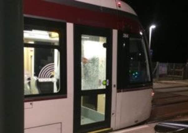 The window of the tram's rear carriage was smashed. Pic: David Hunt