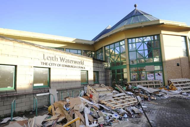 Wood and plaster piled up at Waterworld. Picture: Greg Macvean