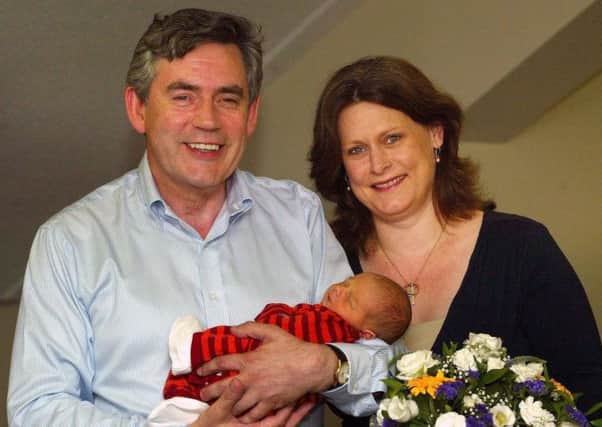 Gordon Brown with wife Sarah and son James outside the ERI in 2006. Picture: PA