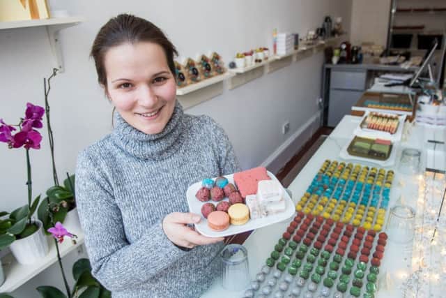 Maggie Simak with some of the delicious pastries on offer in Zukr Boutique in the citys Salisbury Place. Picture: Ian Georgeson