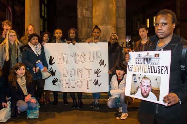 A protest has been held at the American Embassy in Edinburgh over the killing of teenager Michael Brown. Pic: Ian Georgeson