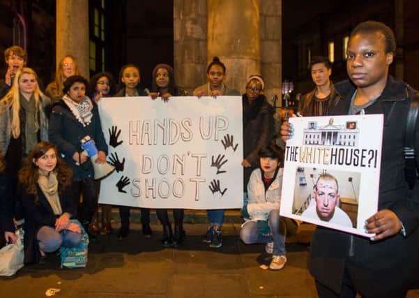 A protest has been held at the American Embassy in Edinburgh over the killing of teenager Michael Brown. Pic: Ian Georgeson