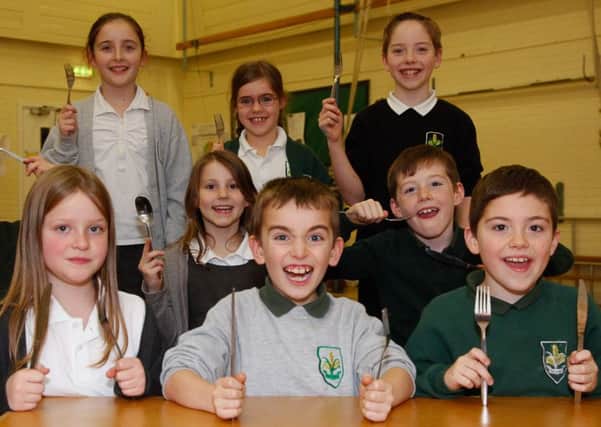 East Craigs Primary in Edinburgh, which is going to benefit from Scottish Government funding to create new dining space to provide free mels to P1-P3.  back row:  Amy Withers, Simone Isler Mccurdy and Liam Barry. Middle row: Lauren Doney and Josh Newby. Front row: Alice Fey, Ben Withers and Rory Barry.