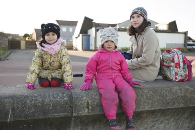 Tiphaine Bellag with four-year-olds daughter Mia, left, and her friend Grena Renan, centre. Picture: Toby Williams