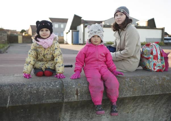 Tiphaine Bellag with four-year-olds daughter Mia, left, and her friend Grena Renan, centre. Picture: Toby Williams