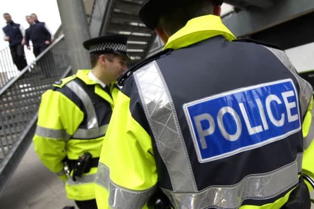 Police have arrested a man in connection with seven robberies on old people in Musselburgh.
