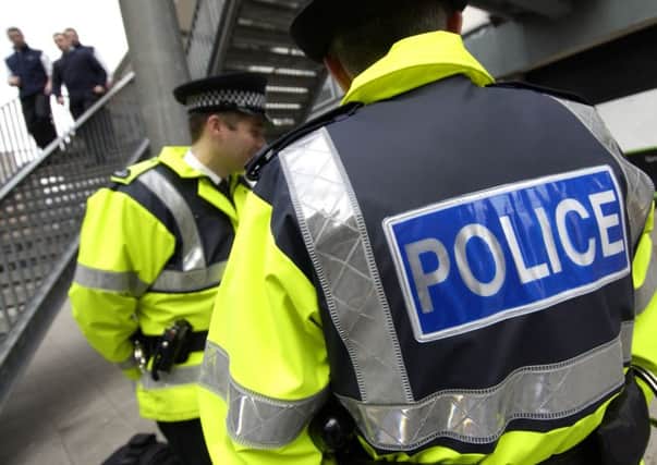 Police have arrested a man in connection with seven robberies on old people in Musselburgh.
