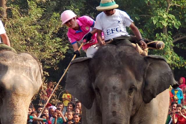 Sam Prentice in the World Elephant Polo Championships in Nepal. Picture: SWNS