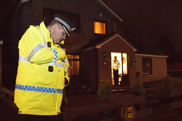 A police officer at the scene of the incident. Picture: Toby Williams