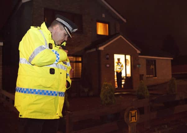 A police officer at the scene of the incident. Picture: Toby Williams