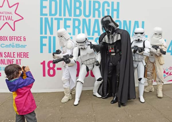 Darth Vader and some pals entertain crowds at the Film Festival. Picture: Phil Wilkinson
