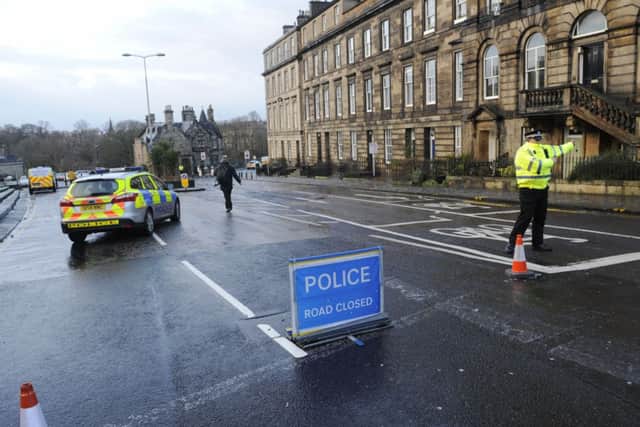 Police stopped traffic crossing the Dean Bridge as the drama unfolded. Picture: Greg Macvean