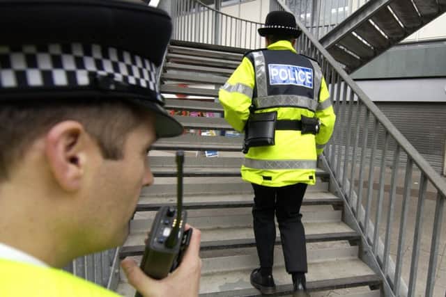 Police have appealed for witnesses after a young mother was assaulted and robbed.