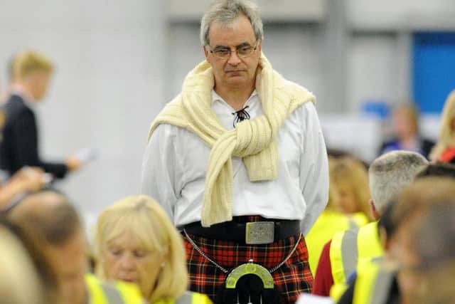 An observer watches as referendum votes are totted up at Ingliston. Picture: Lisa Ferguson