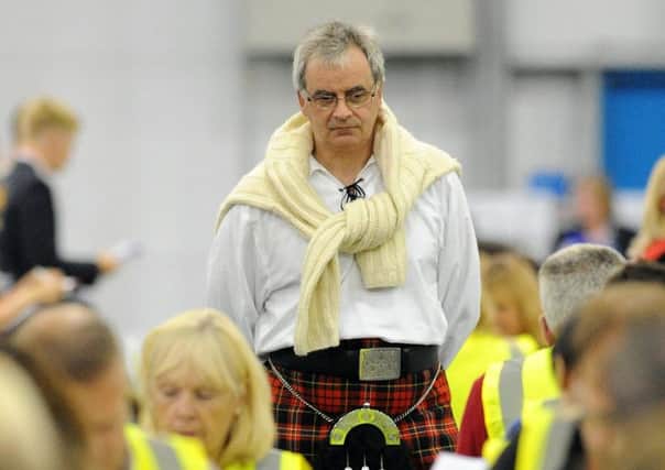 An observer watches as referendum votes are totted up at Ingliston. Picture: Lisa Ferguson