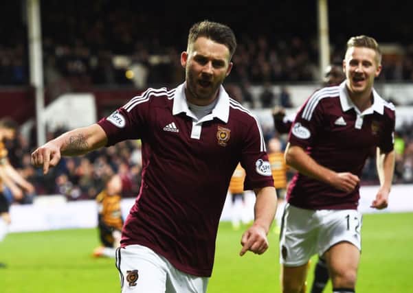 Hearts' James Keatings (left) celebrates his goal. Picture: SNS