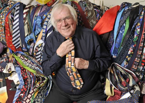 Joe Higgison shows off his amazing collection of weird and wonderful ties  more than one for every day of the year. Picture: Phil Wilkinson