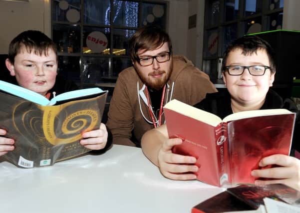 Alex Adams, left, and Daniel Cooper are joined by Tony Stewart for one of the book sessions. Picture: Lisa Ferguson