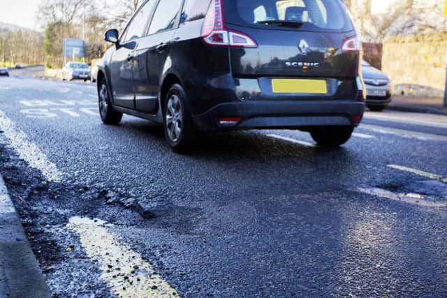 Potholes are everywhere in Edinburgh. Picture: Malcolm McCurrach