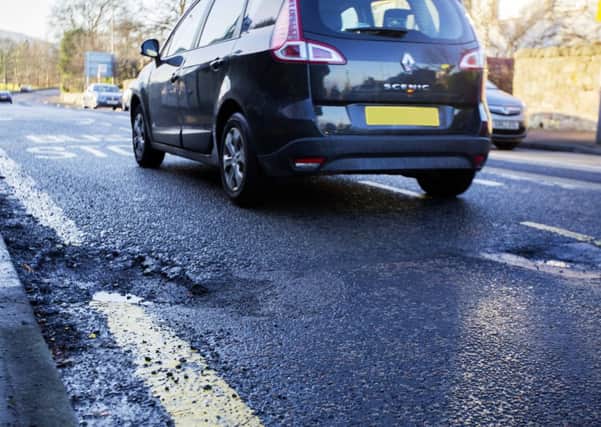 Potholes are everywhere in Edinburgh. Picture: Malcolm McCurrach