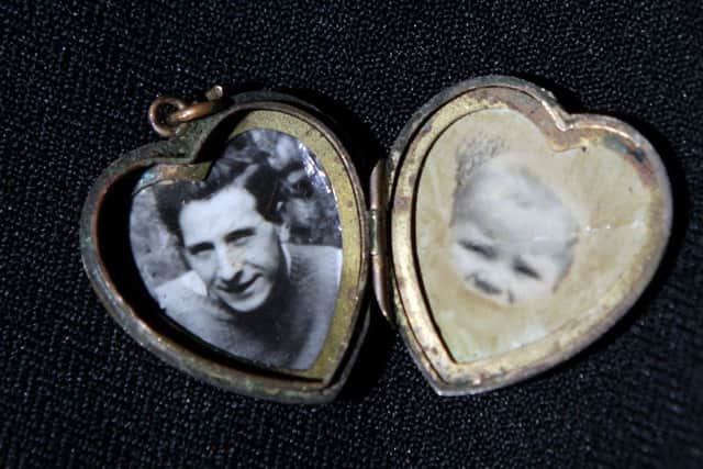 The locket contains two photos. Picture: Hemedia