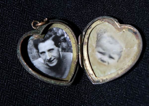 The locket contains two photos. Picture: Hemedia