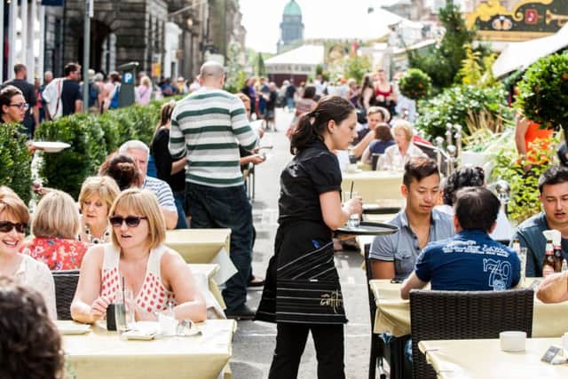 Outdoor dining has proven popular in many city centre locations, including George Street. Picture: Ian Georgeson