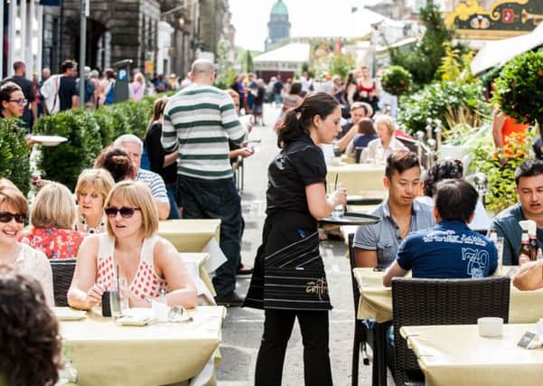 Outdoor dining has proven popular in many city centre locations, including George Street. Picture: Ian Georgeson