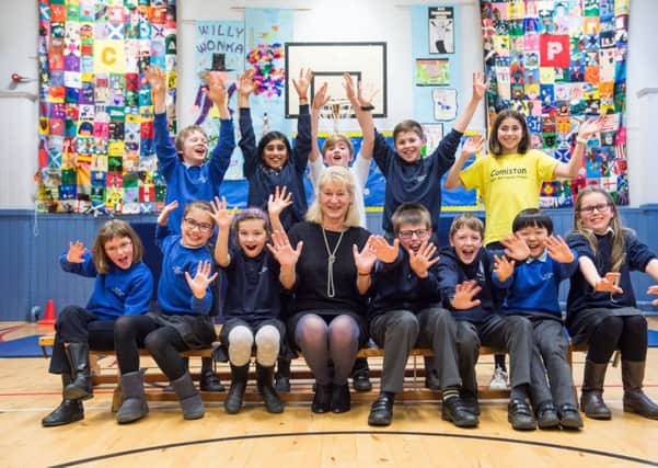 Headteacher Liz Grierson celebrates with pupils from South Morningside Primary. Picture: Ian Georgeson