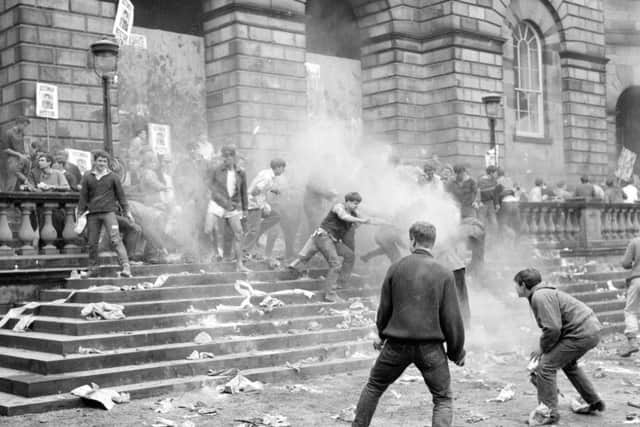 Flour and rotten fruit fly during a rectorial battle in the Old College Quad in 1959. Picture: TSPL