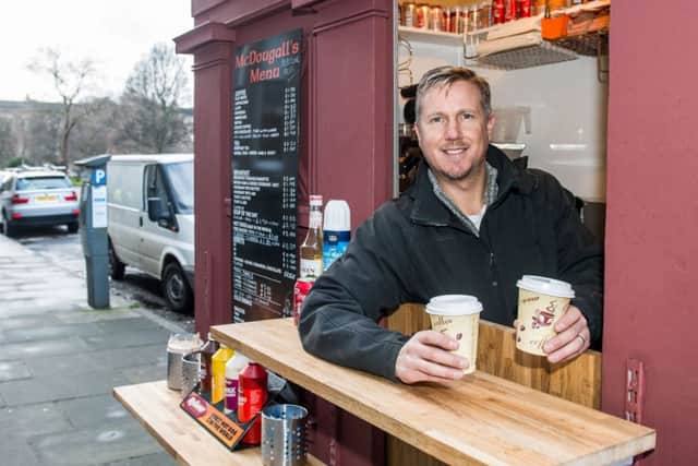 John McDougall has set up a doughnut bar in a former police box on Drumsheugh Gardens. Picture: Ian Georgeson