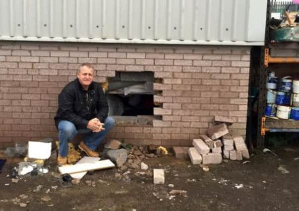 Tom Logan is still shell-shocked after thieves smashed a hole in the wall of Recycling First in Macmerry. Picture: Alex Lawrie