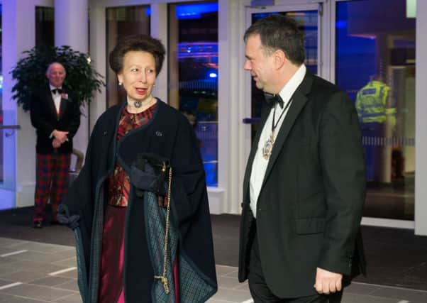 Princess Anne is greeted by Lord Provost Donald Wilson. Picture: Malcolm Cochrane