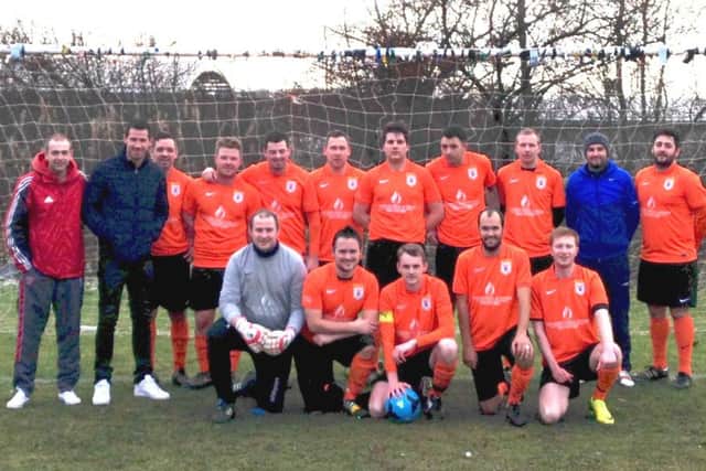 Ryan McGowan, second from left, with the Loanhead Parish Church squad; below, lifting the Scottish Cup with Hearts in 2012. Picture: comp
