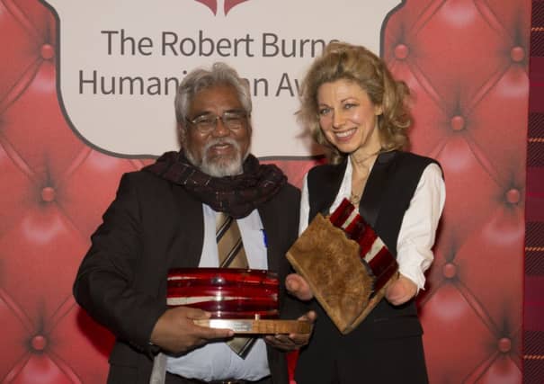 Olivia Giles is pictured alongside runner-up Sompop Jantraka