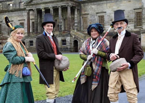 Pauli Holmes, Murray Hope, Van Stuart and Ronnie Hope try on their period costumes at Penicuick House. Picture: Gordon Fraser