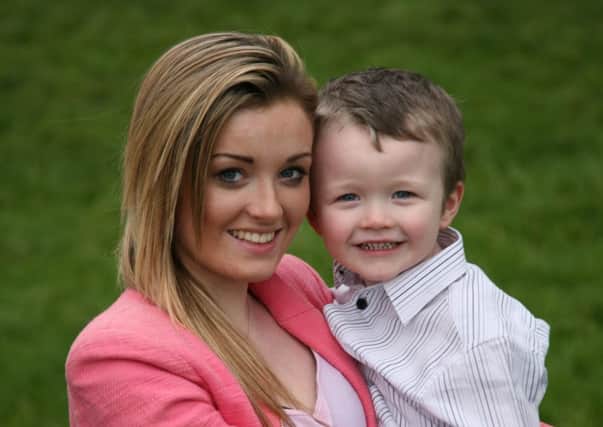 Sammie Welch and son Rylan hit the headlines for giving up a train seat and receiving a note of thanks and £5 from a stranger. Picture: SWNS