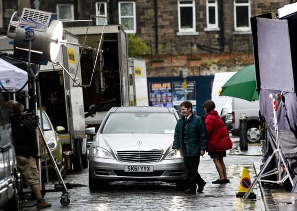 A film crew sets up in Junction Place in Leith. Picture: TSPL